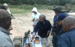 Group of people having beer and snacks together